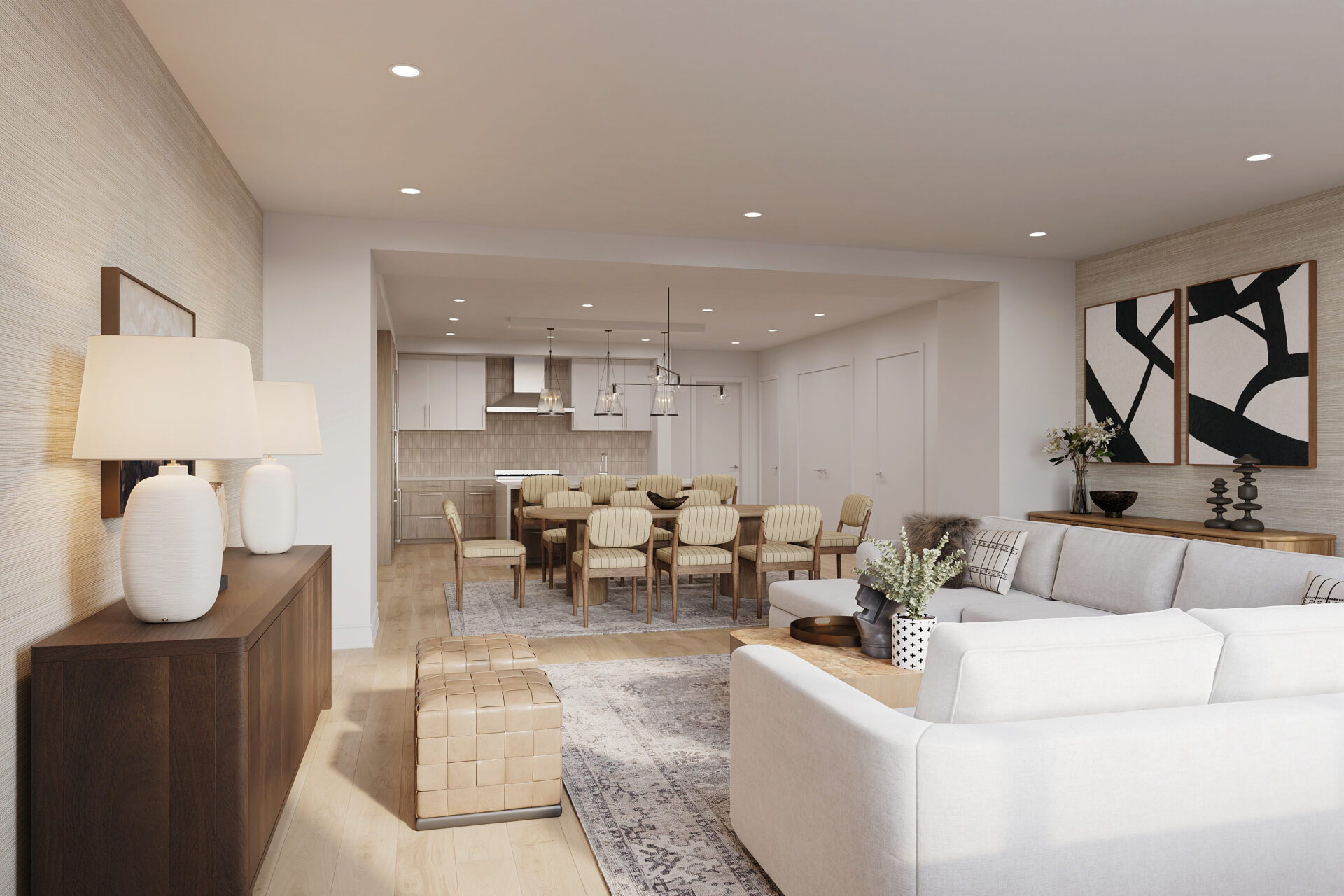 The Henry Bozeman luxury condo interior with open floor plan connecting living room, dining area, and kitchen