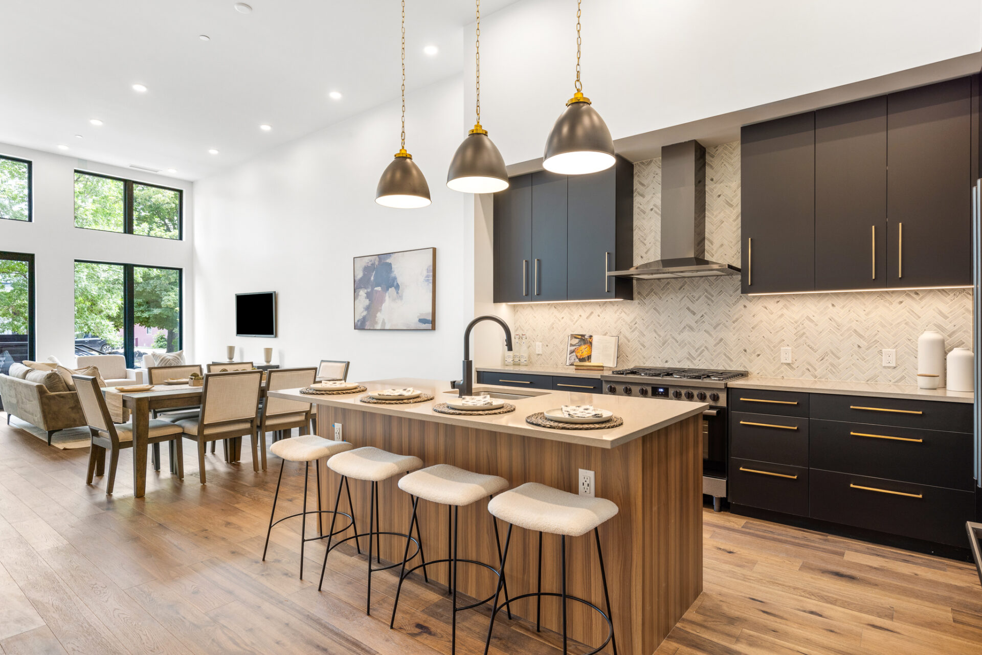 Modern kitchen with quartz counters and Bosch appliances in a Henry Bozeman condo