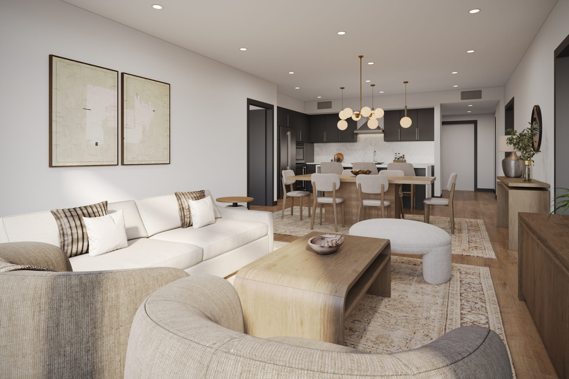 Open floor plan apartment at The Henry Bozeman MT with connected living, dining, and kitchen and hardwood floors