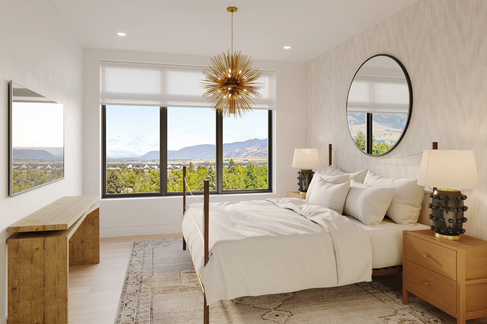 The Henry Bozeman penthouse master bedroom with direct Bridger Mountain views, king upholstered bed, and gold halo chandelier